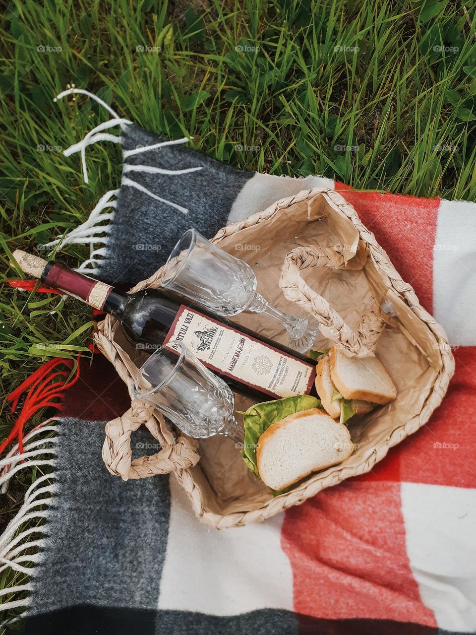 Preparing a romantic dinner for two in the city park