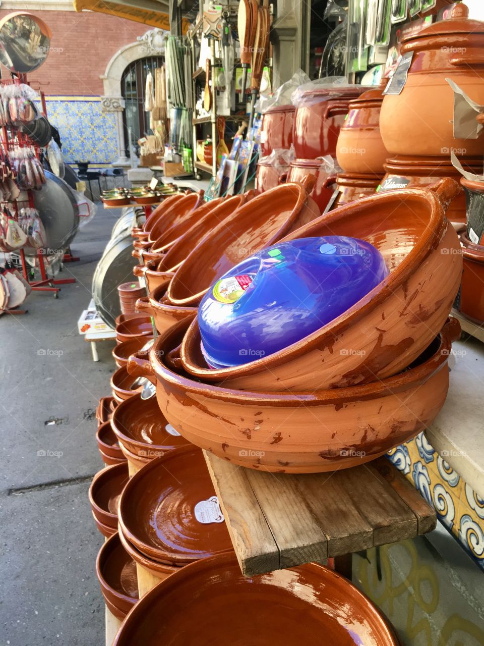 Traditional Spanish pots for sale on the streets of Valencia. The beautiful terra-cotta is just as good as art for a kitchen. 