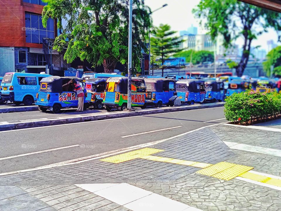 Typical Indonesian public transportation is called bajaj
