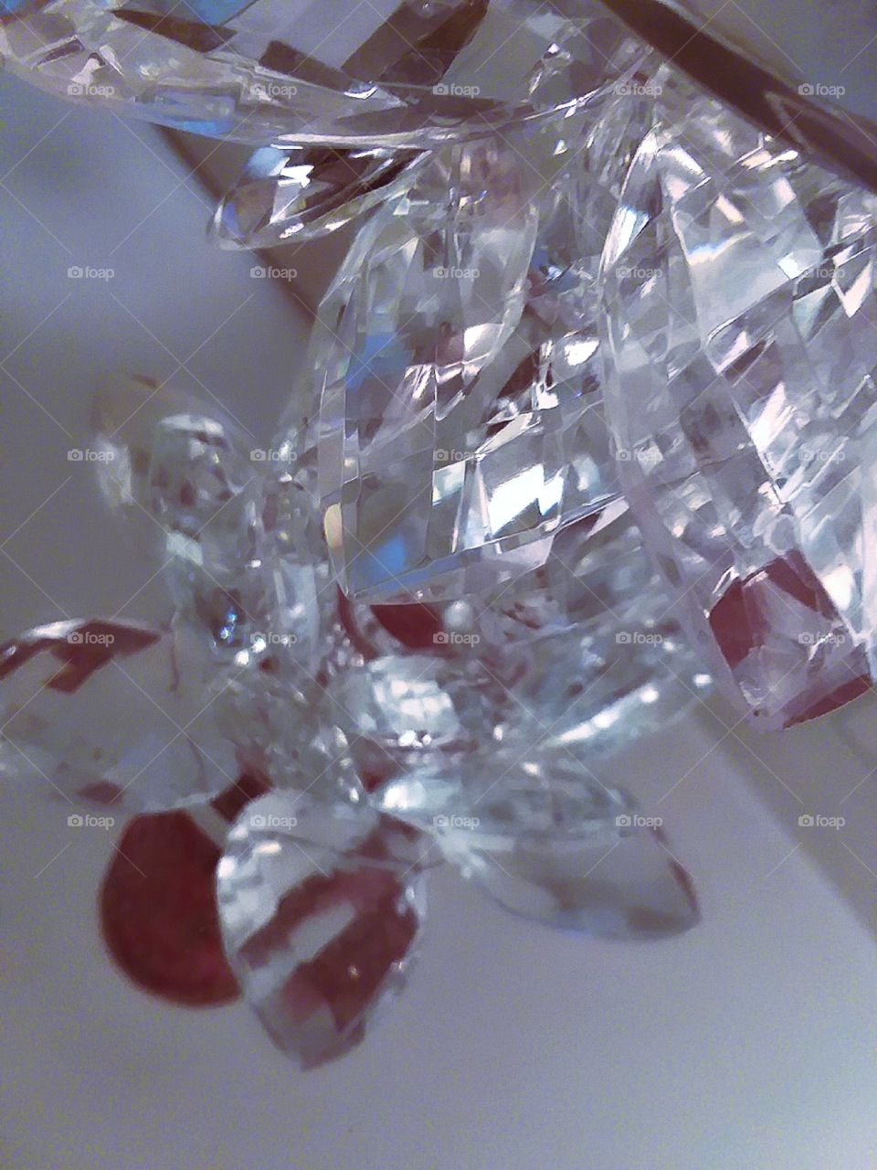 abstract shot of a candleholder and its reflection in an underlying mirror with an intriguing angle