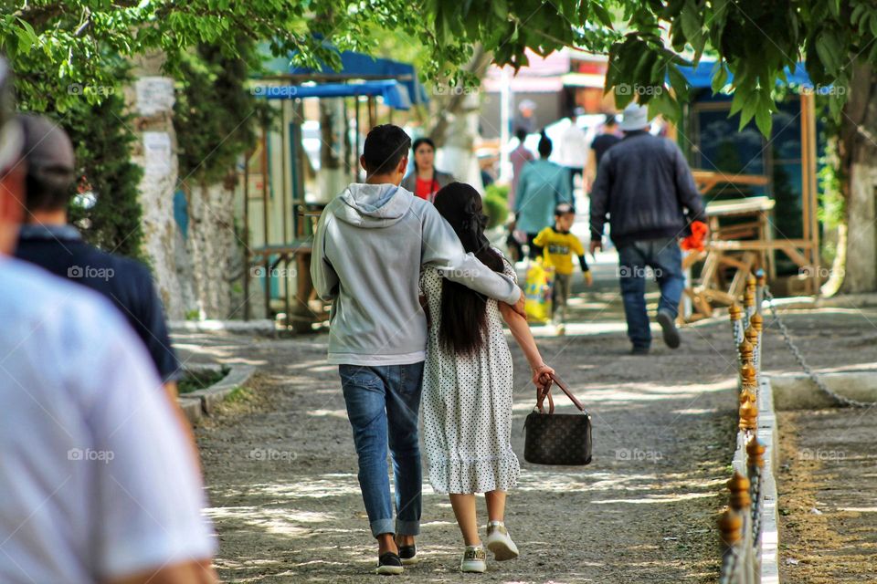 Asian couple in love on a walk