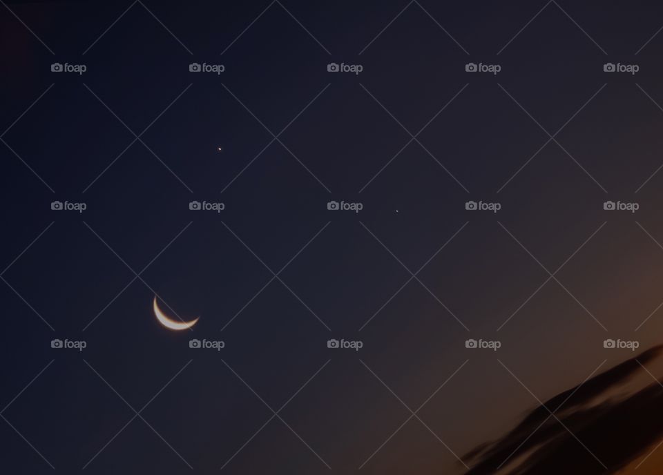 The moon smiling phenomenon in twilight sky make us feel good