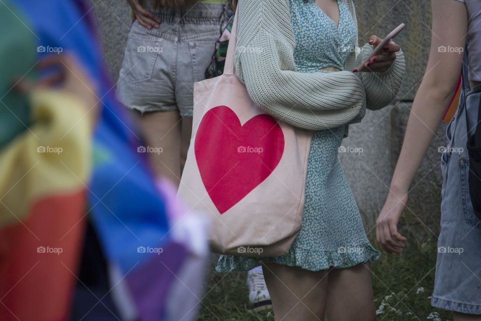 A heart on bag in the crowd