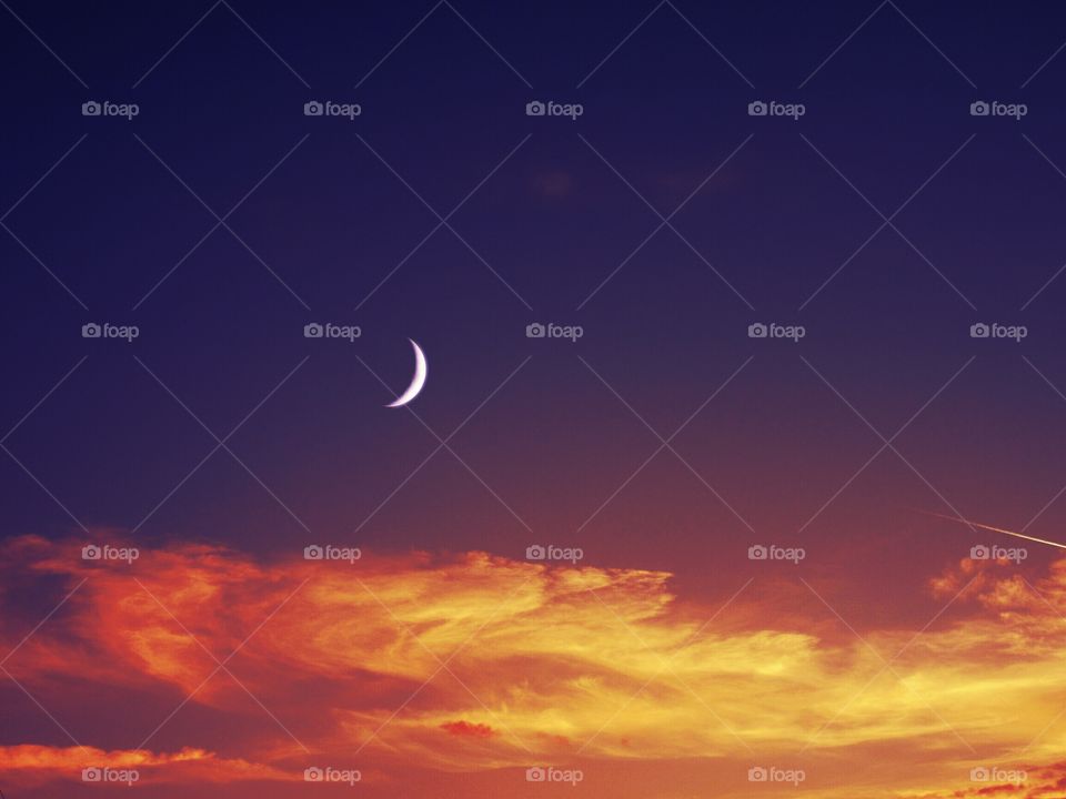 Crescent moon at sunset