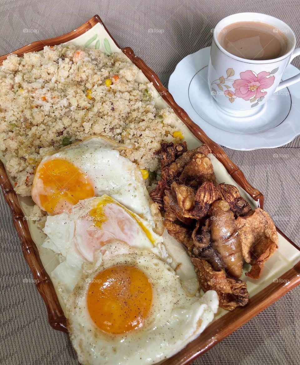 Filipino Breakfast Ideas ( fried rice,dried squid,and eggs with coffee )