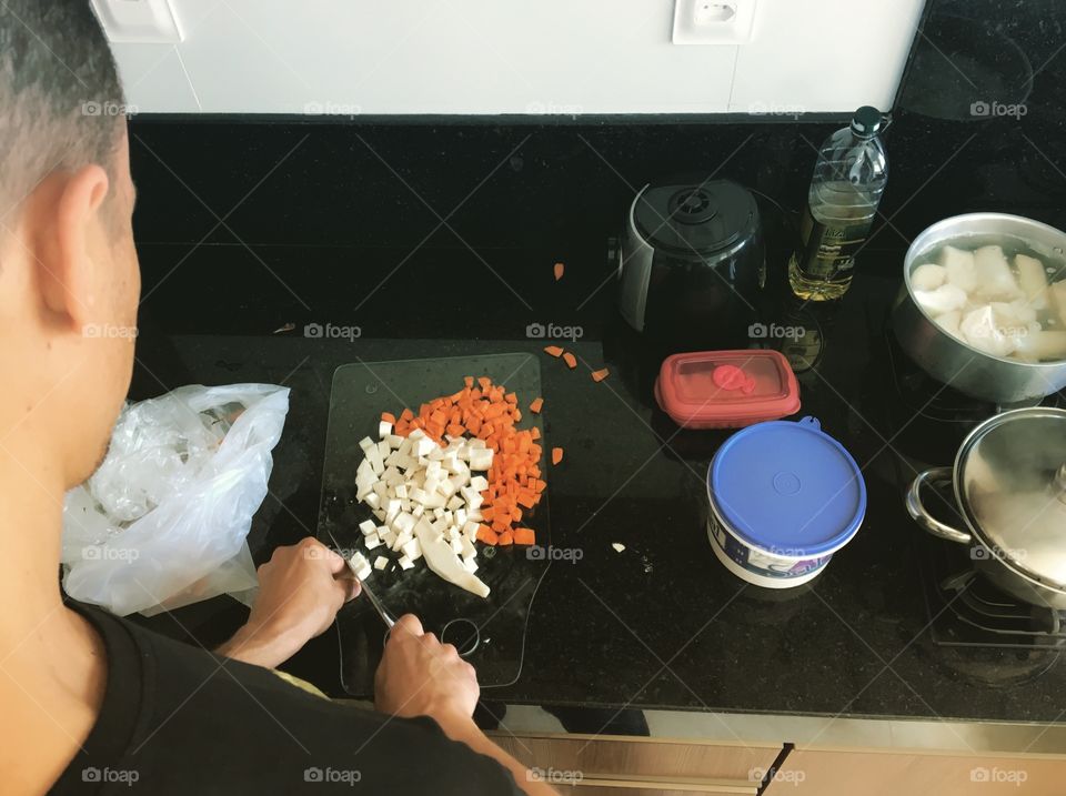 Husband cooking for wife