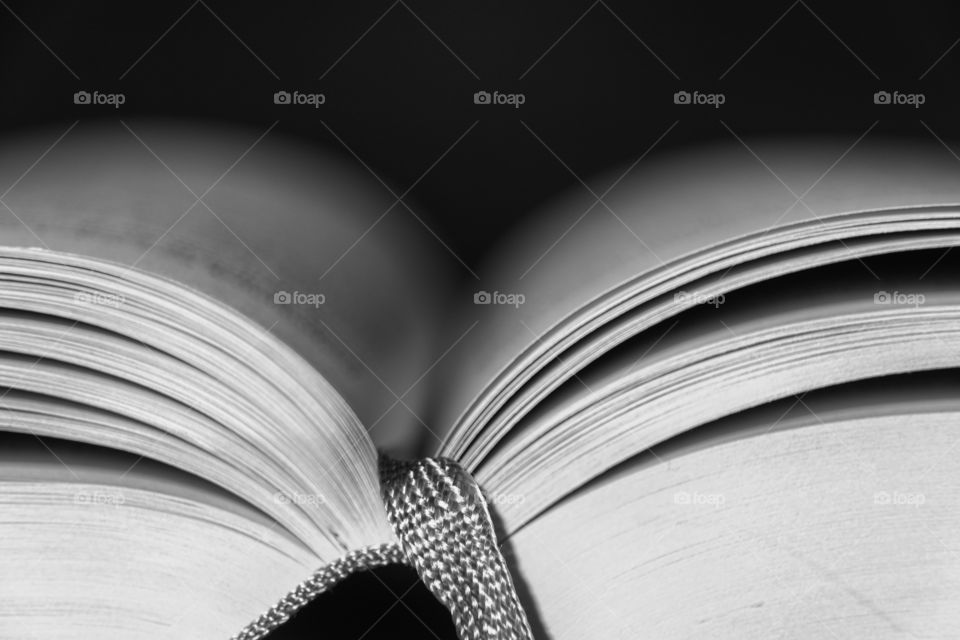 Open book with ribbon