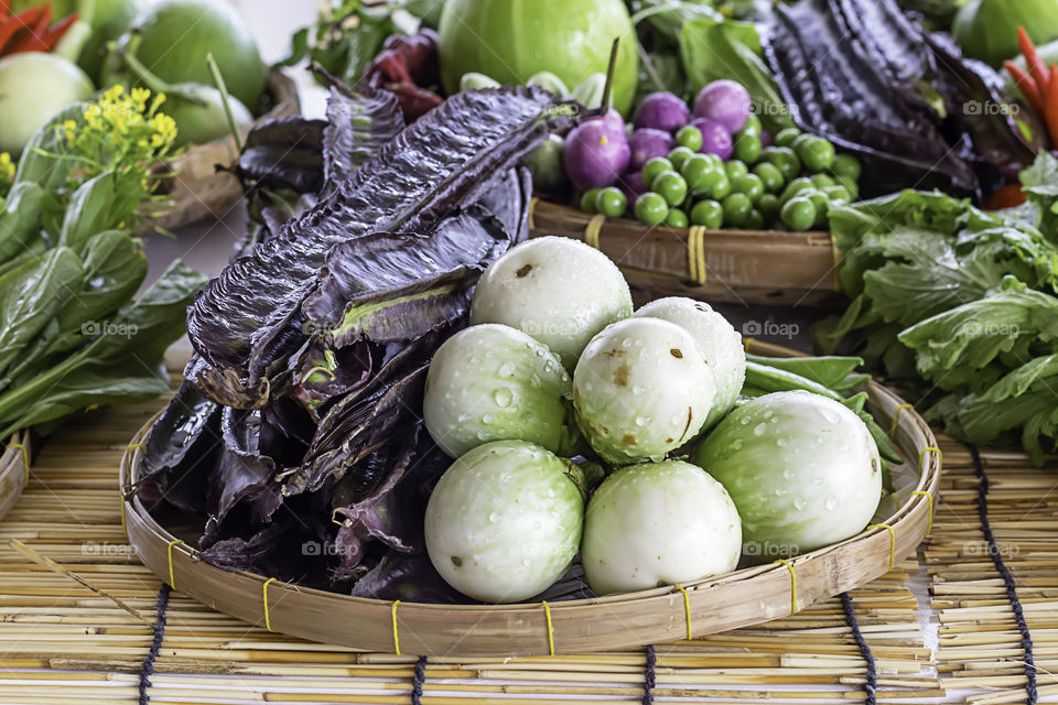 Eggplant and Purple Winged Bean,Vegetables in bamboo baskets.