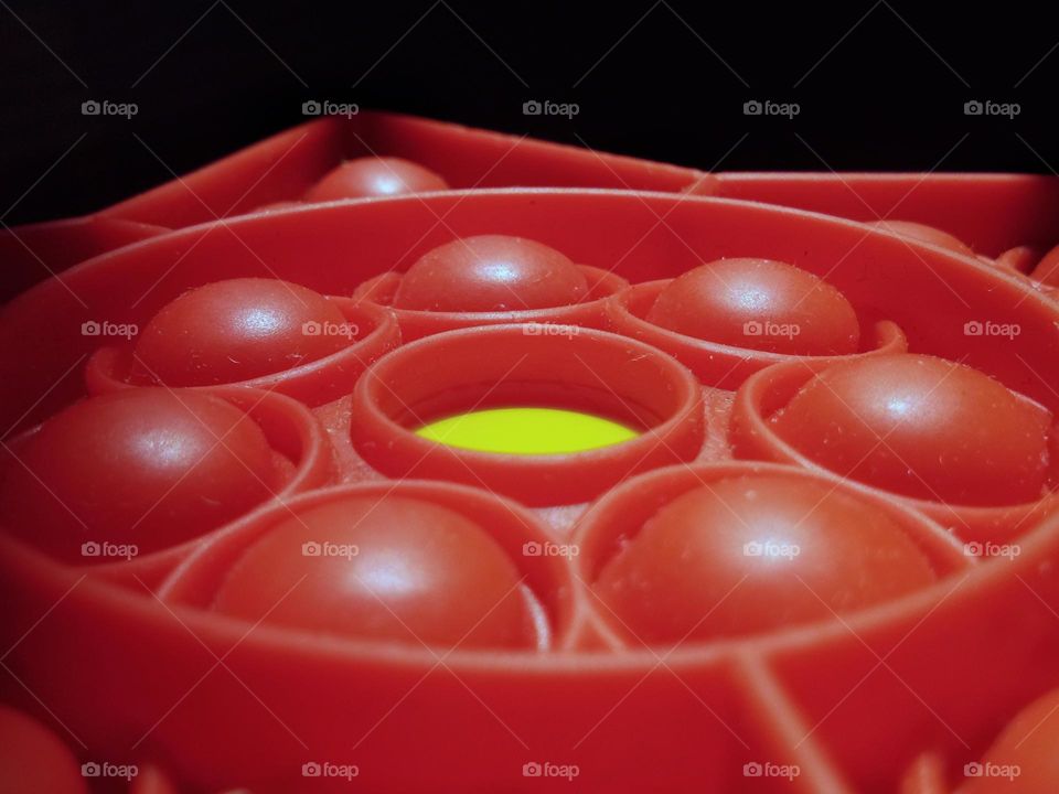 yellow, in the middle of the red