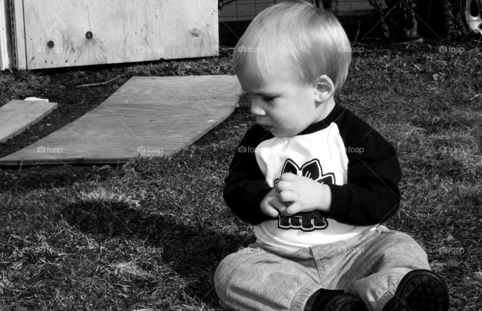 Little boy looking away