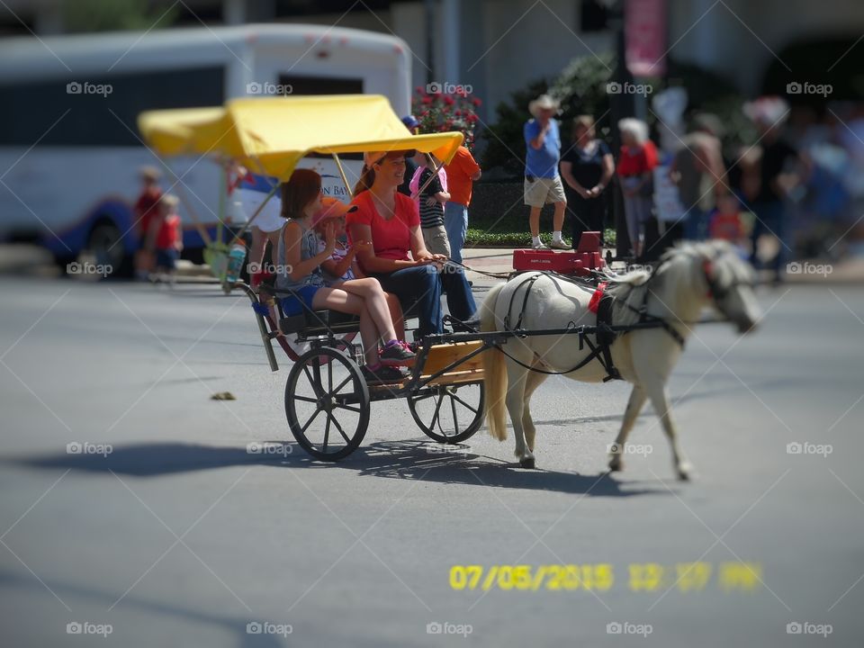 4th of July weekend parade. This is a picture of a horse and carriage that rode in the local parade in Graham Texas