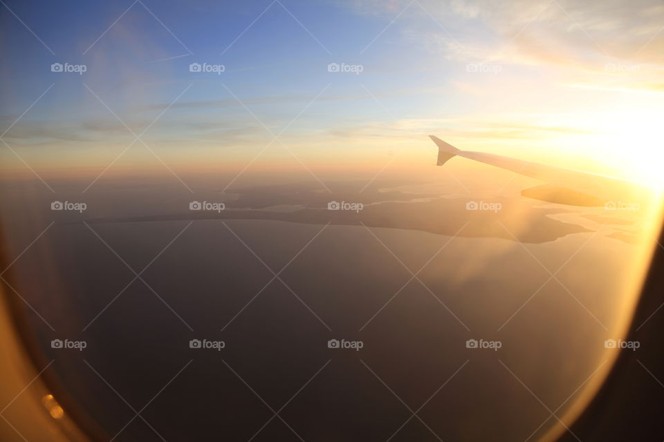 beautiful sunset and sky picture was taken on the airplane