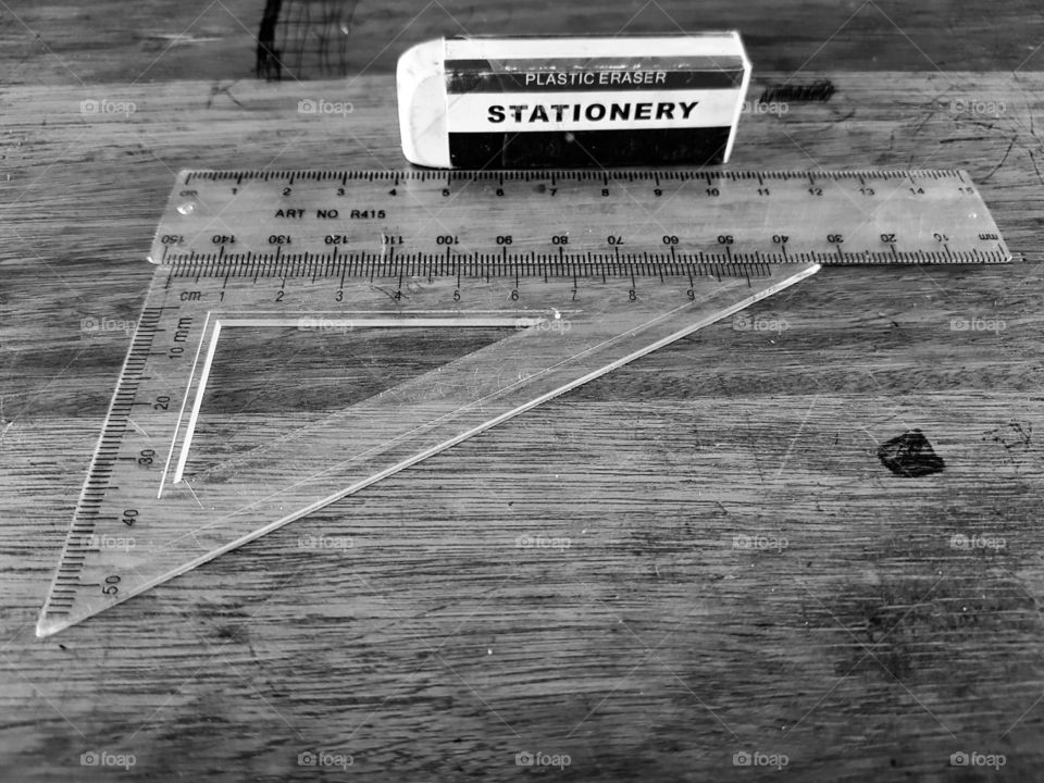 black and white sastionary on school bench