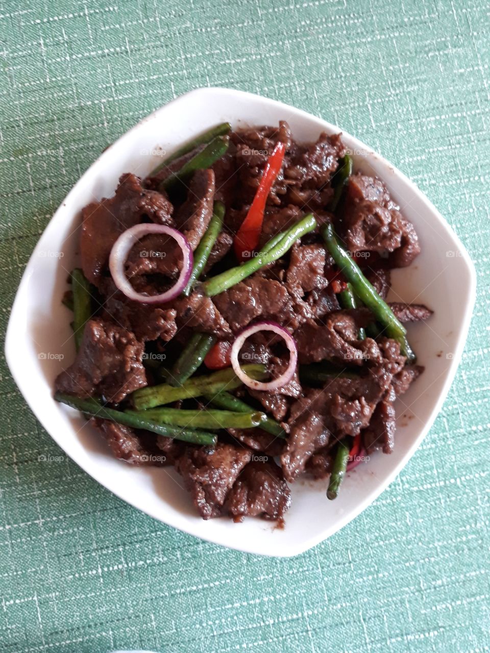 Filipino style beef steak with crisp string beans, perfect with rice.
