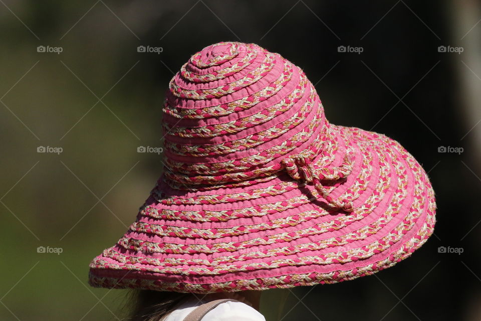 A person with pink hat in the park