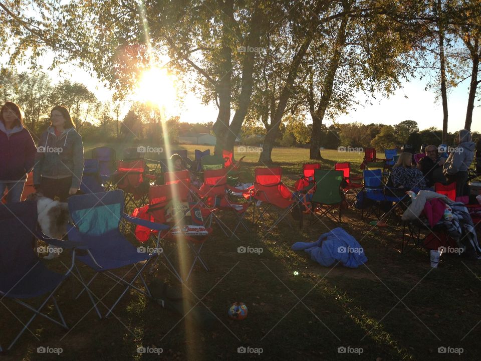 Camping activity at sunset