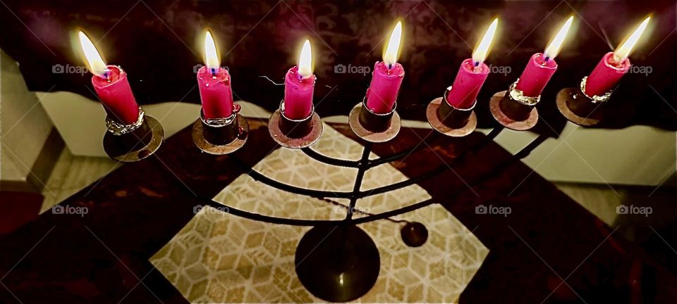 The menorah with seven candles is lit by Jewish people worldwide. Christians also partake in the ritual of lighting candles on it to usher in the Sabbath, the day of rest as well as the advent of Christmas. 2023. Hypnotic Productions