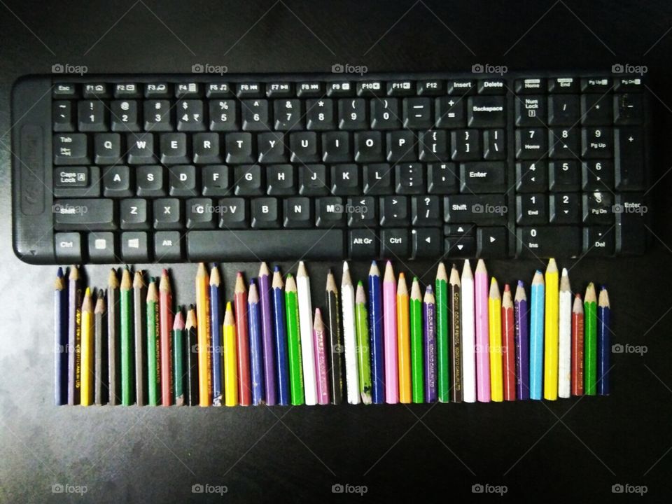 color pencils and key board