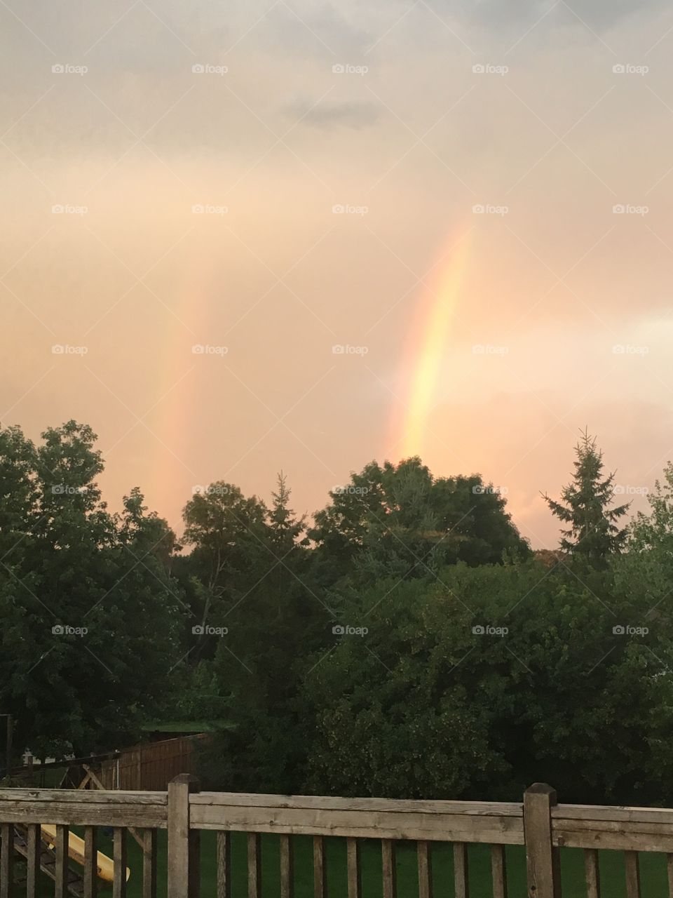 Sunset and a double rainbow after a summer storm!