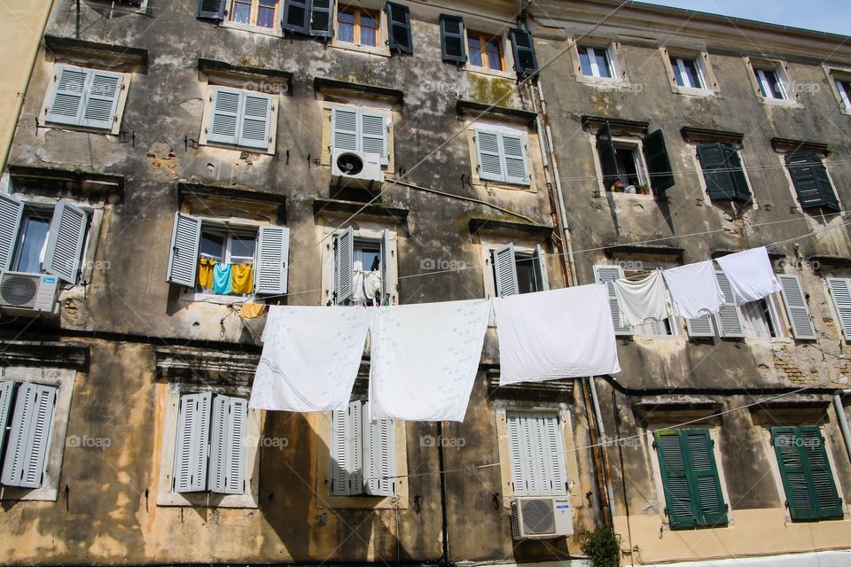 Greek windows. Windows and washing in Corfu