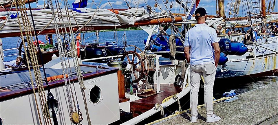 The „Hanse Sail“, a big annual regatta in „Rostock“ by the „Baltic Sea“ in former „East Germany“ attracts lots of people from boat enthusiasts to boat owners, other seafarers, tourists and regular onlookers. 2023. Hypnotic Productions