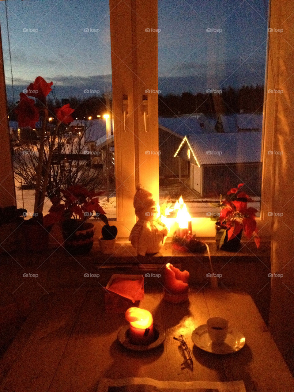 window candle early morning christmastime by liselott
