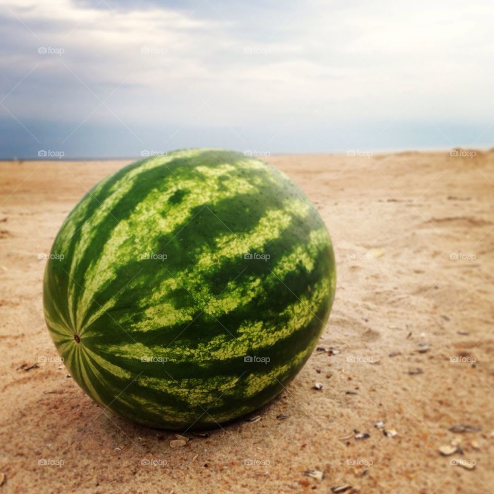 Sweet watermelon on beach