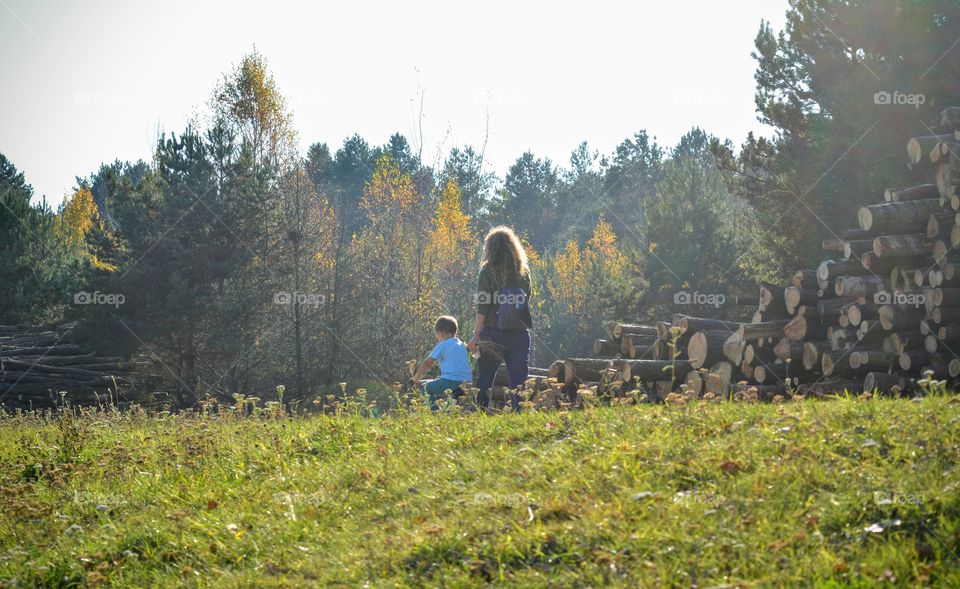 family walking outside, nature landscape, social distance