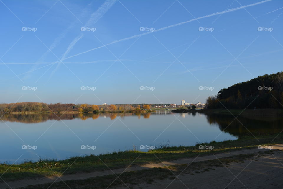 lake beautiful nature landscape autumn time blue sky background, no filters