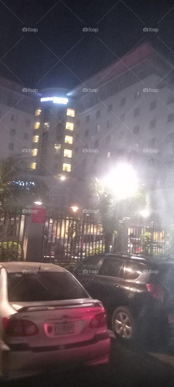 Twinkling windows , the beauty of evening light. Bask in the beauty of evening light with the view of light twinkling from these windows at night