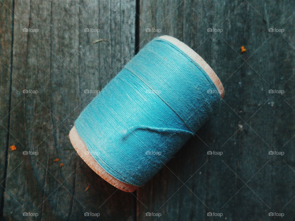 spool of blue thread