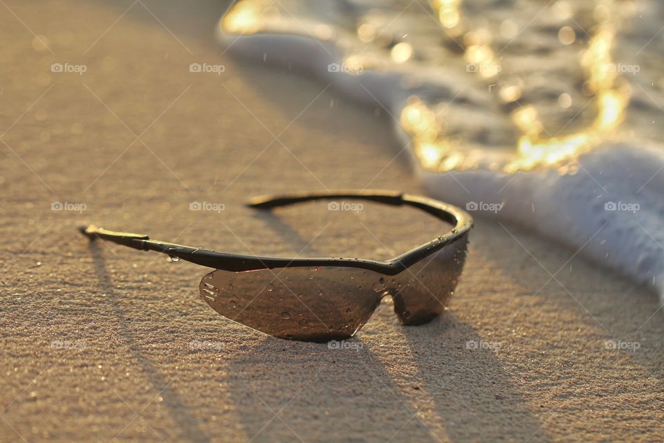 sunglasses at coastline