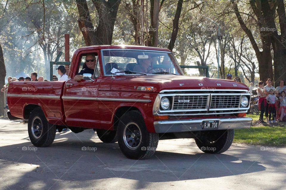 Front of a vintage Ford F100 truck, like new.