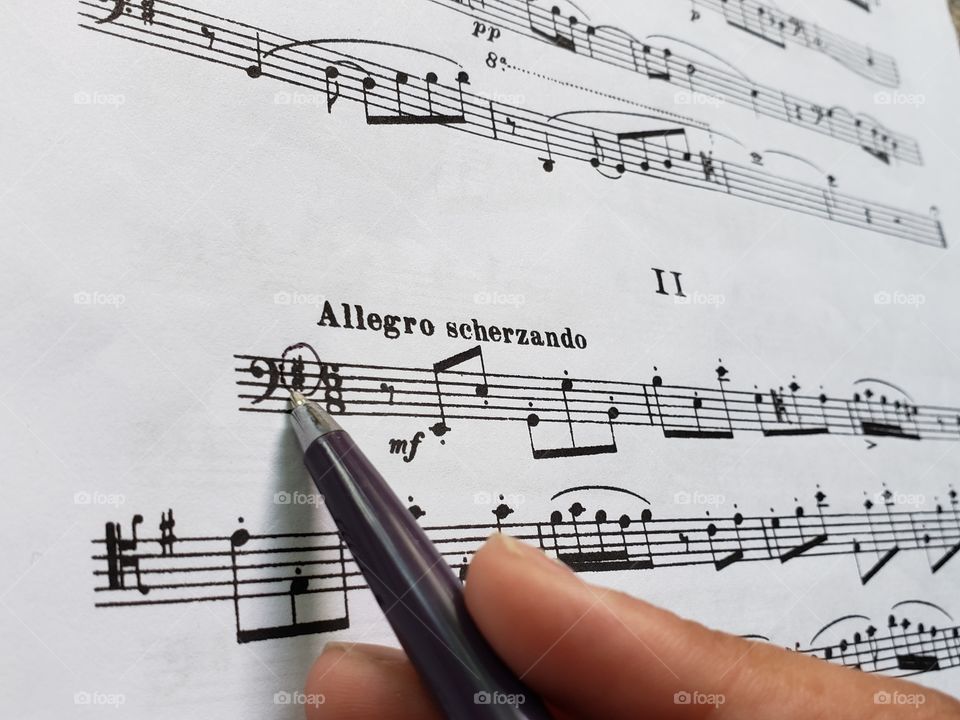 sheet music marking with a pen