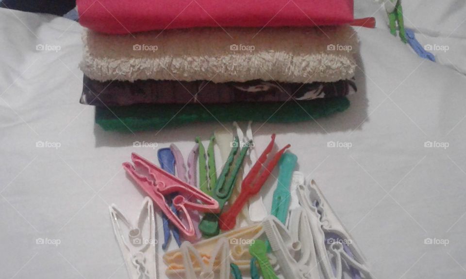 pegs and folded  clothes