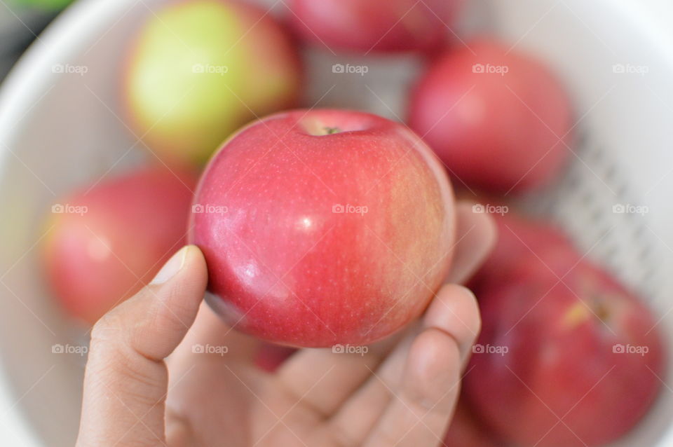 Holding Apple 