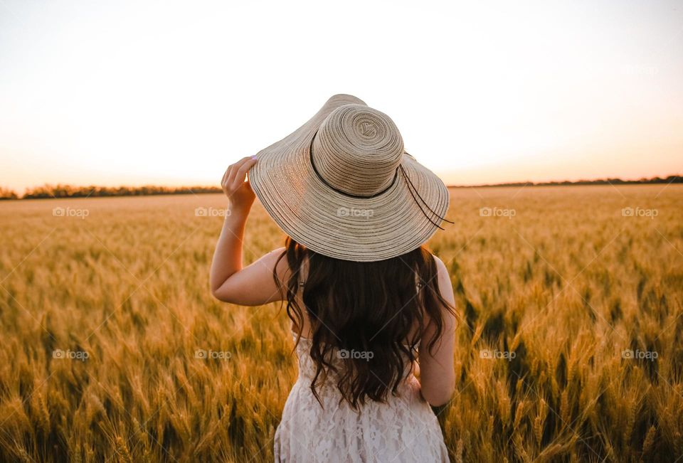 Girl in wheat field