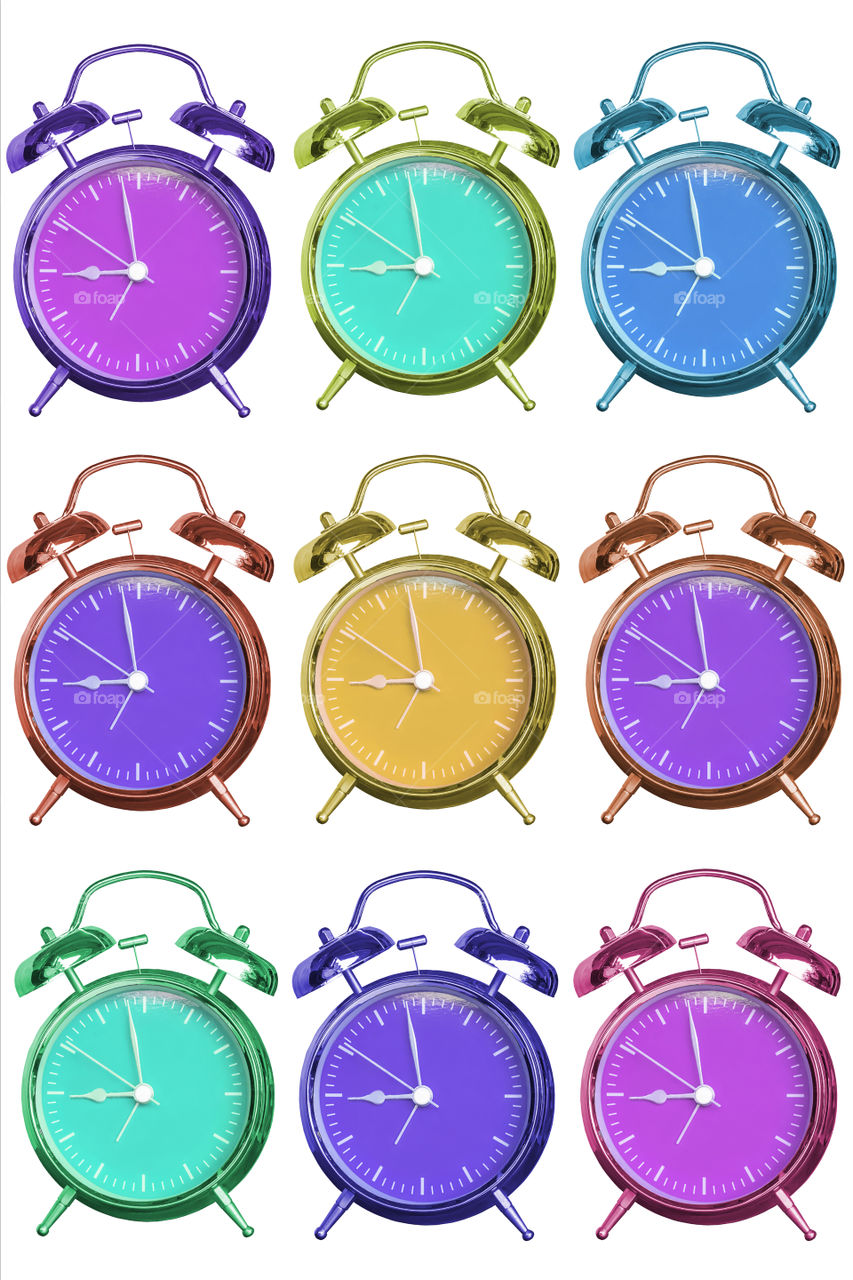 Isolated Alarm clock with Beautiful colors on a white background with clipping path.