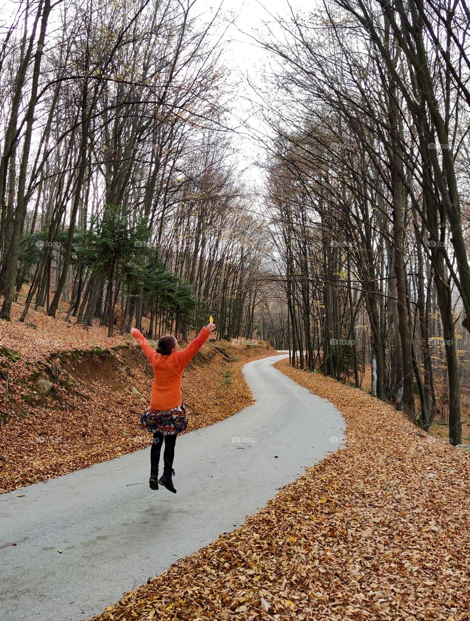 Happy hike in autumn forest