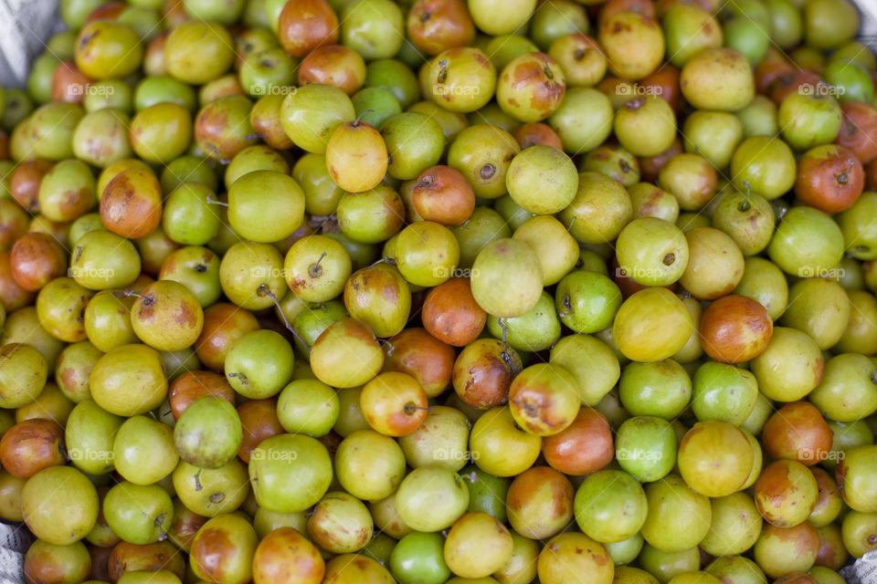 Selection of green and red apples at the local market. If an apple a day keeps the doctor away, then this should keep you healthy for a year