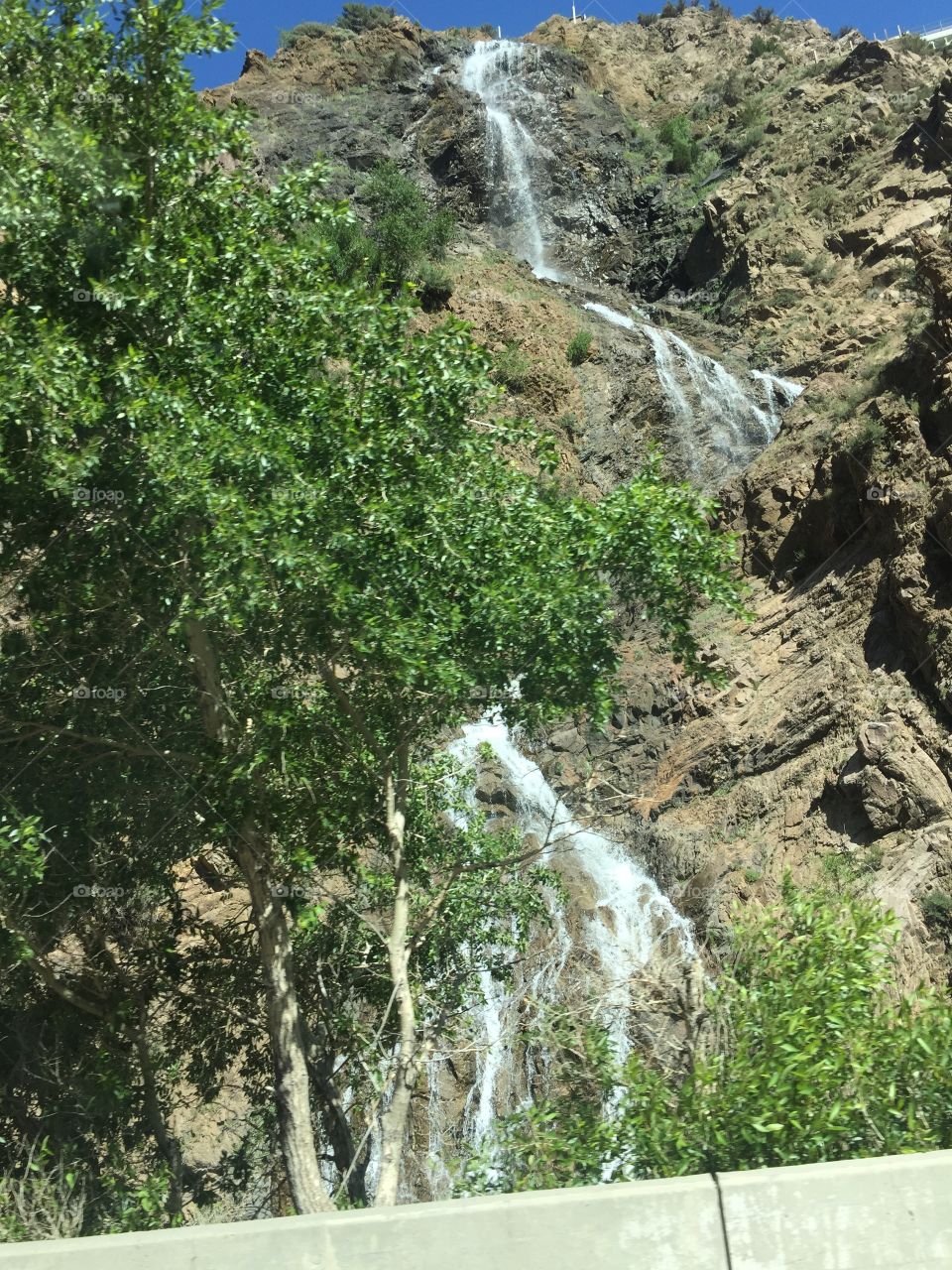 This waterfall is near my house and has been a great part of my childhood. The white, green, and brown has always been a eye popping feature for me. I love water and love spending time with it. 