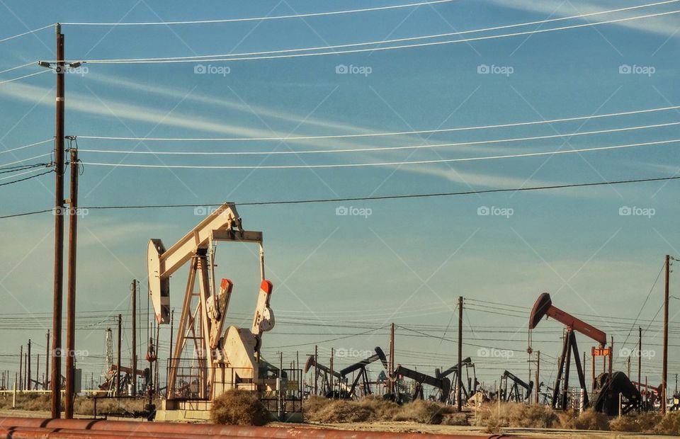 Desert Crude Oil Well. Petroleum Pumping Facility
