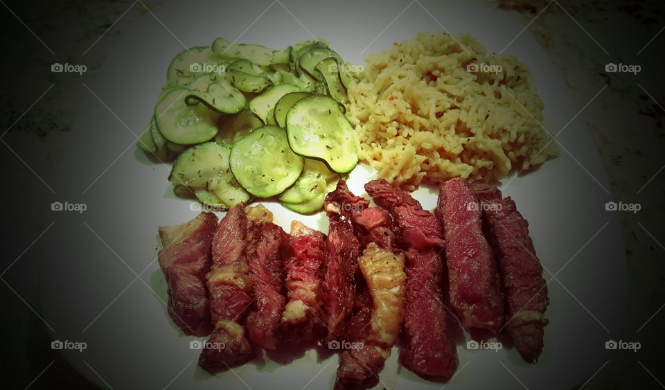 Delicious Steak Dinner With Squash and Rice