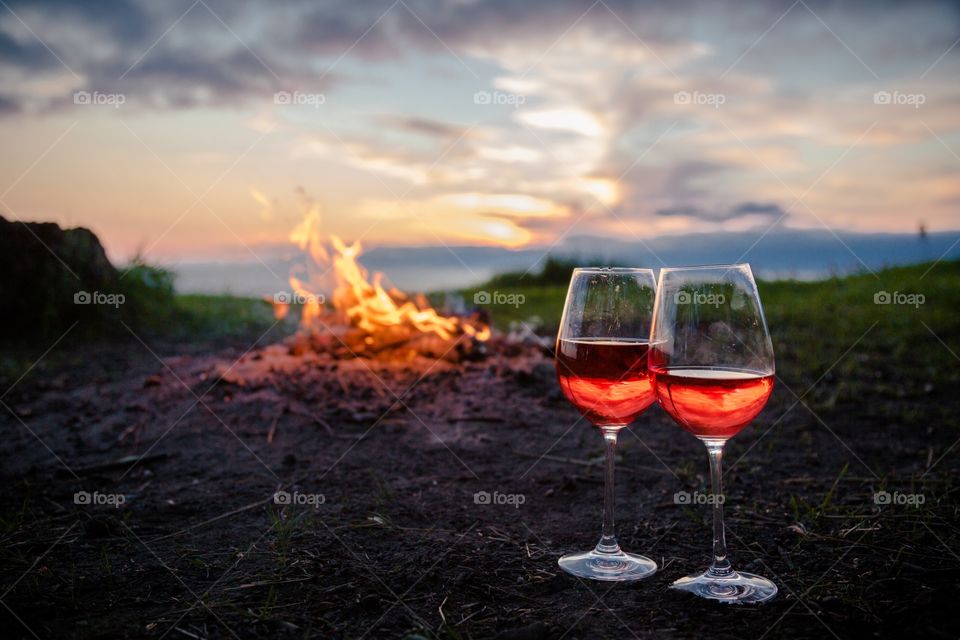 Beautiful sunset colors and wine glasses