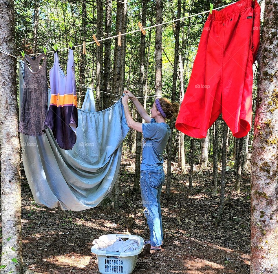 Hanging laundry out to air dry instead of using the dryer