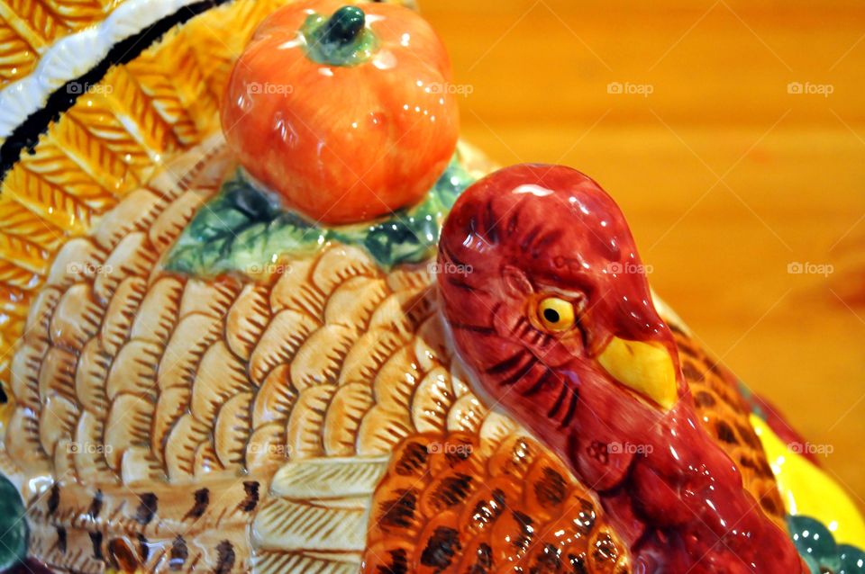 Close up of a ceramic turkey shaped soup tureen. 