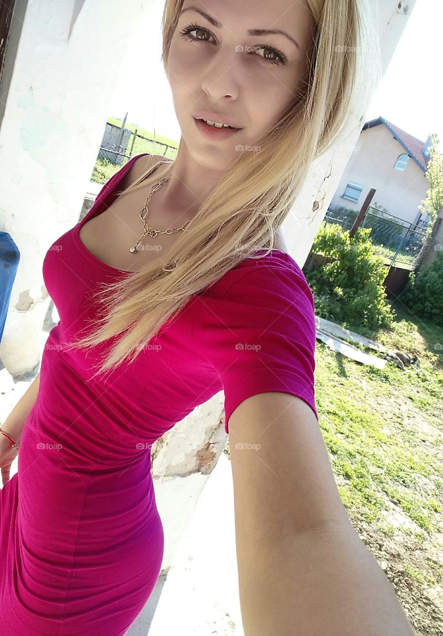 Gorgeous girl taking selfie at outdoors