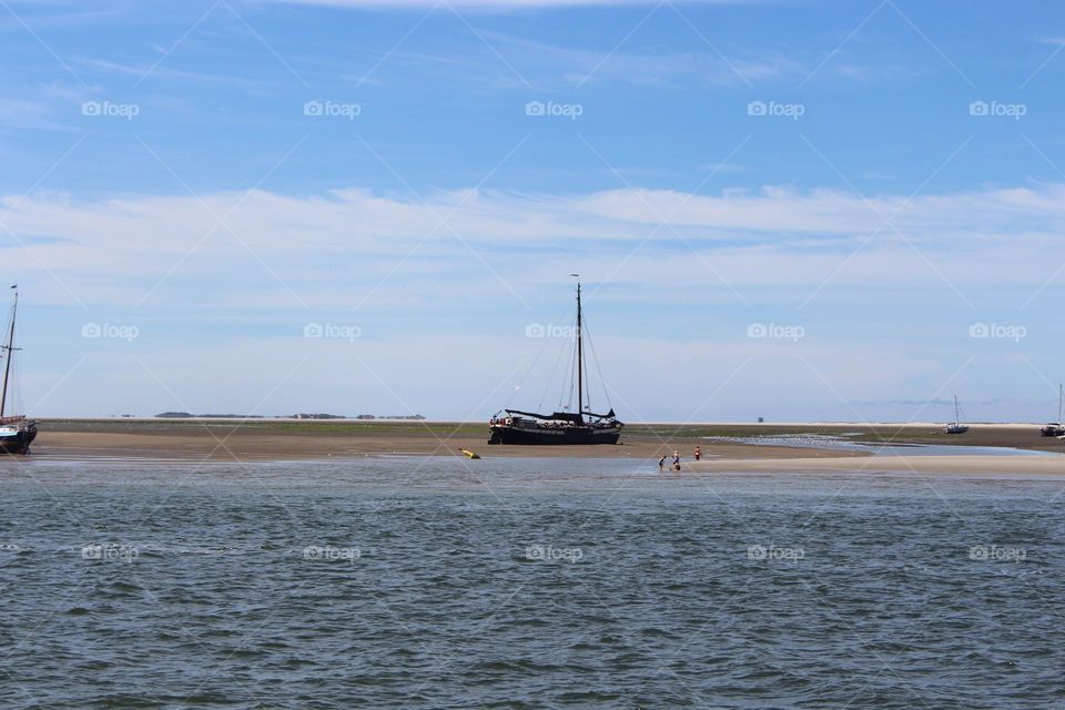 ship gets stuck on Englishmanplate. That used to happen accidentally, but now people do it on purpose for the experience. And they have to wait until the tide comes in.