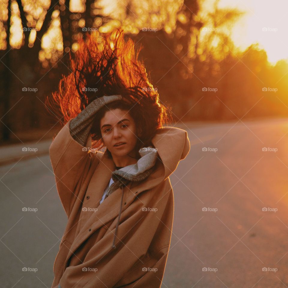 Woman walking on road