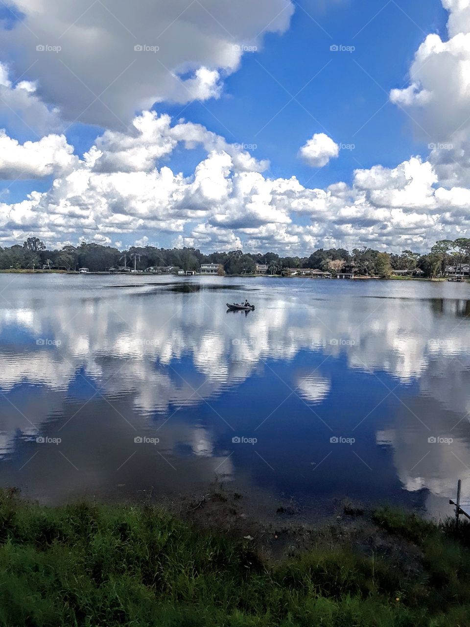 Beautiful cloud reflections off Central  Florida Lake.